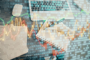 Financial graph displayed on woman's hand taking notes background. Concept of research. Multi exposure