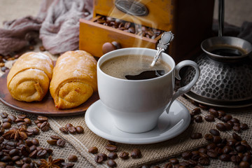 Black coffee on an old background in a cup