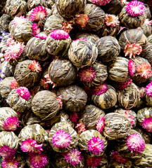 Fototapeta na wymiar Jasmine blooming flower tea balls on the market