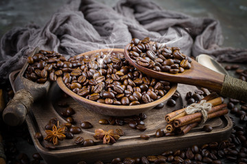 Coffee grains on a table with accessories for coffee
