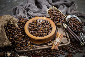 Coffee grains on a table with accessories for coffee