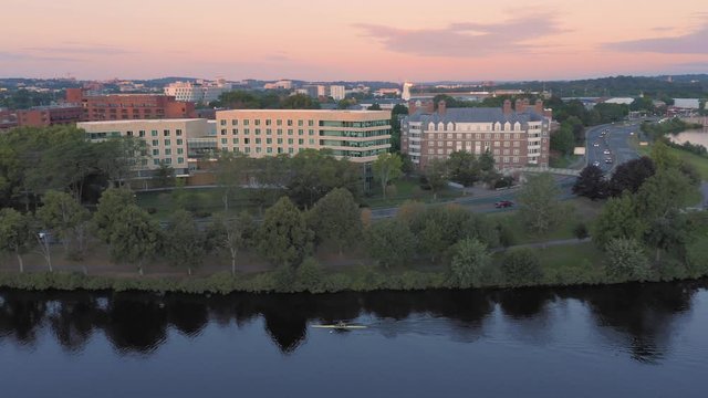 Aerial: Man Rowing On The Charles River At Harvard University. Boston, Massachusetts, USA. 28 August 2019