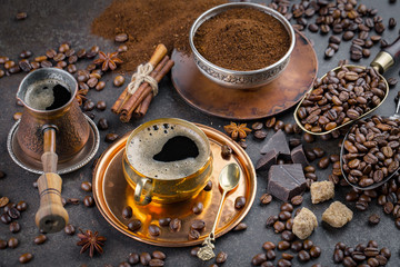 Black coffee on an old background in a cup