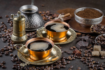 Black coffee on an old background in a cup