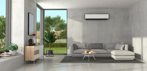 Fototapeta na wymiar Miniimalist living room with modern furniture and air conditioner