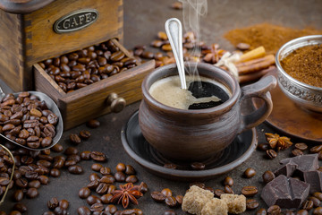 Black coffee on an old background in a cup