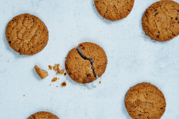 Flat lay tasty crunchy malt cookies on white background.