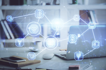 Computer on desktop with social network theme icon. Multi exposure. Concept of international connections.