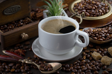 Black coffee on an old background in a cup