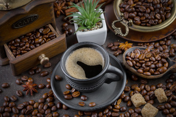 Black coffee on an old background in a cup