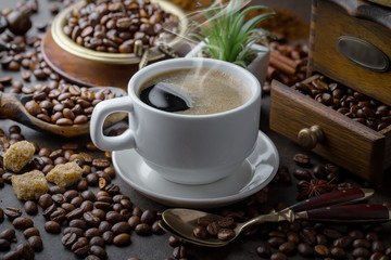 Black coffee on an old background in a cup