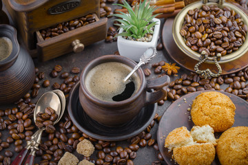 Black coffee on an old background in a cup