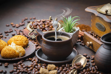Black coffee on an old background in a cup