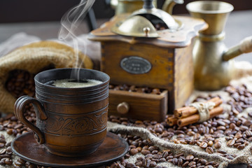 Black coffee on an old background in a cup