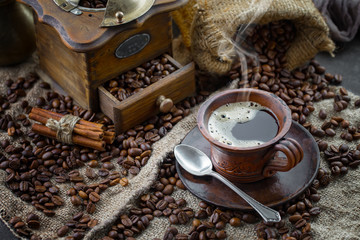 Black coffee on an old background in a cup