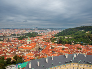 Fototapeta premium Praha City vie with old architecture and dark stunning clouds 