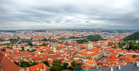 Fototapeta na wymiar Praha City vie with old architecture and dark stunning clouds 