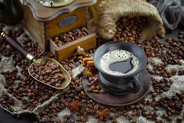 Black coffee on an old background in a cup