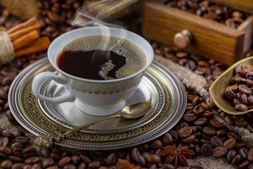Black coffee on an old background in a cup