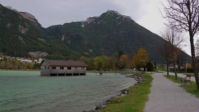 boat house on Achensee (Lake Achen) on a windy autumn day in the mountains of the alps. Tirol, Austria