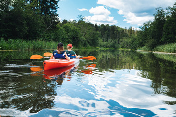 Canoe in river peaceful summer day - obrazy, fototapety, plakaty