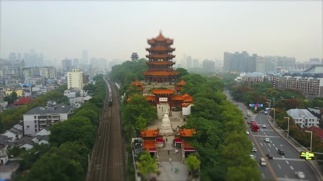day time wuhan cityscape yellow crane temple traffic road aerial panorama 4k tilt shift china