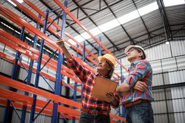 Asian Engineer man working in building factory