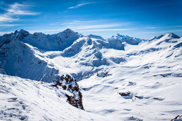 Winter panoramic view of the snowy high mountains of Elbrus in the Russia