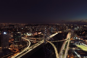 Fototapeta premium Aerial view of famous Estaiada's Bridge decorated for Christmas and New Year Celebrations. Sao Paulo, Brazil
