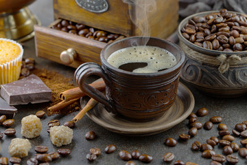Black coffee on an old background in a cup