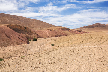 Barren landscape with red colored cuestas near the Dades Gorges