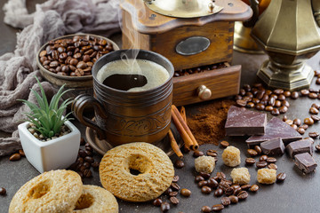 Black coffee on an old background in a cup