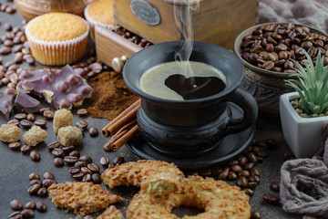Black coffee on an old background in a cup