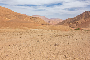 Bald ochre colored mountains near the Dades Gorges
