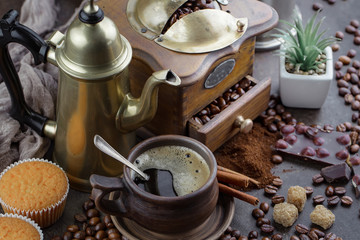 Black coffee on an old background in a cup