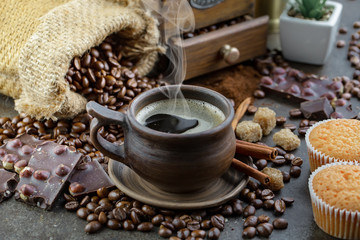 Black coffee on an old background in a cup