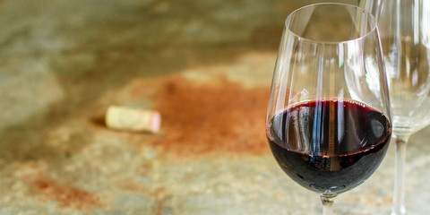 red wine glass (delicious alcoholic drink, holiday) menu concept. food background. top view. copy space