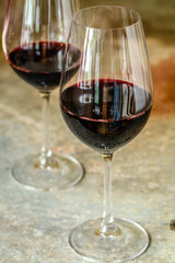 red wine glass (delicious alcoholic drink, holiday) menu concept. food background. top view. copy space