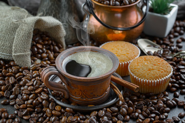 Black coffee beans on an old backgroundм