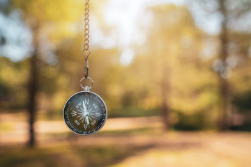 finding our way in nature with a compass, looking for the right direction