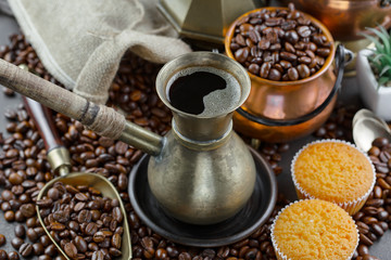 Black coffee on an old background in a cup