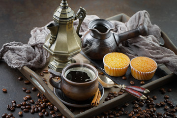 Black coffee on an old background in a cup