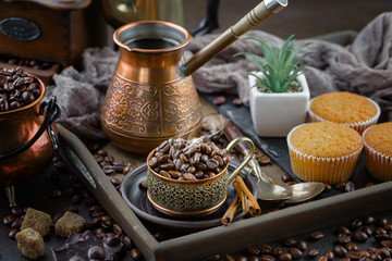 Black coffee beans on an old backgroundм