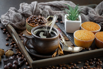 Black coffee on an old background in a cup