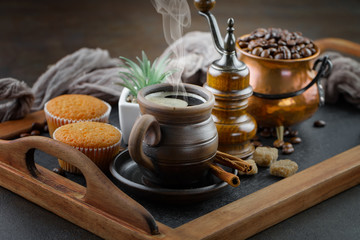 Black coffee on an old background in a cup