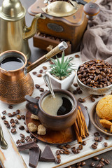 Black coffee on an old background in a cup