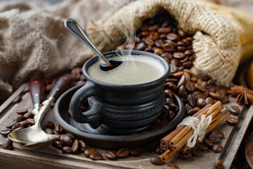 Black coffee beans on an old backgroundм