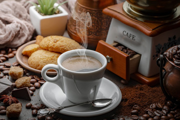 Black coffee on an old background in a cup