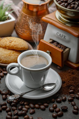 Black coffee on an old background in a cup