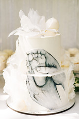 Candy bar. Beautiful white cake with a picture of the child's foot, the Concept of children's birthday parties